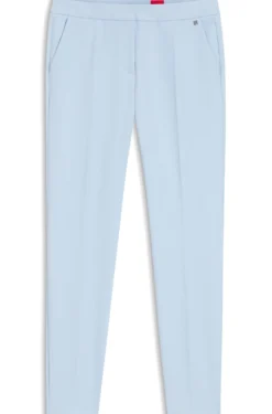 Slim-fit trousers in stretch fabric with logo rivet