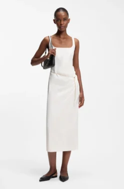 Square-neck dress with golden chain belt