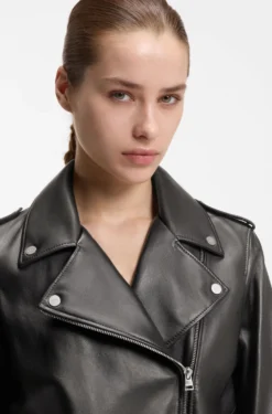 Straight-fit biker jacket in leather with zipped details