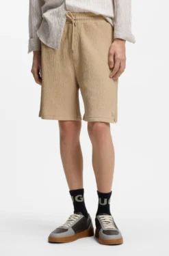 Stretch-cotton shorts with creased effect