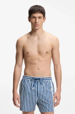 Striped swim shorts with vertical logo