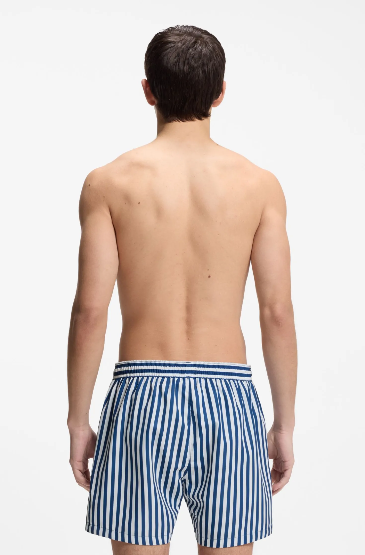 Striped swim shorts with vertical logo