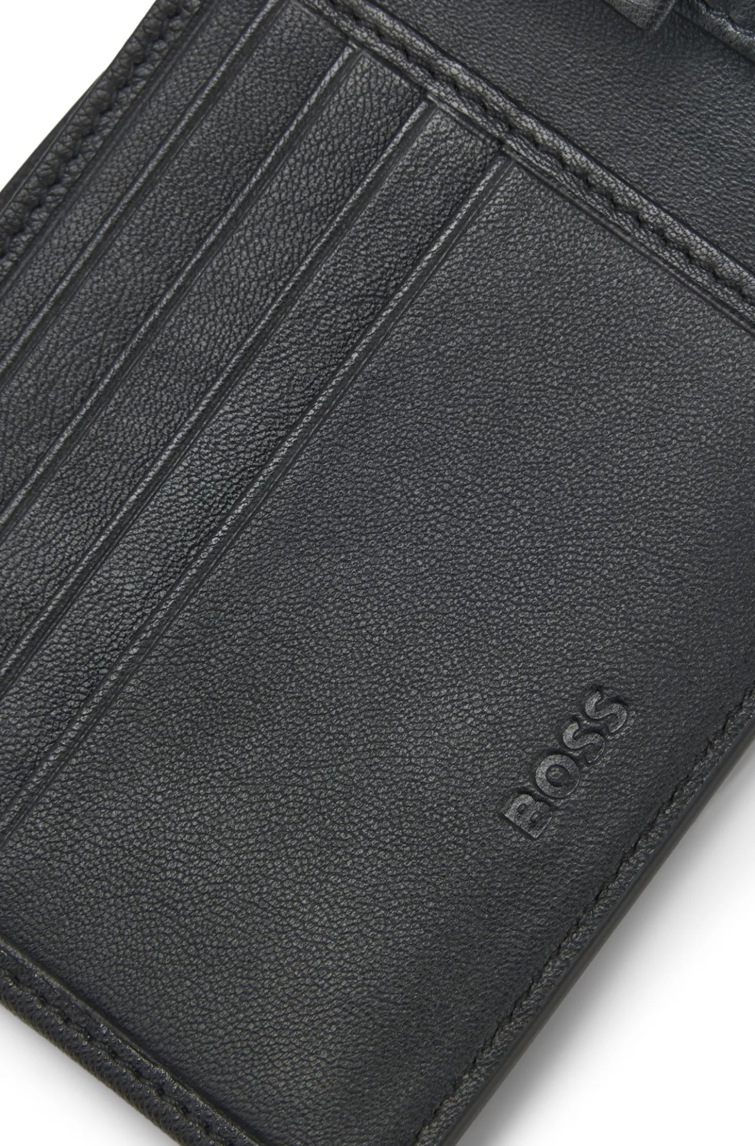 Structured folding wallet with metal logo lettering