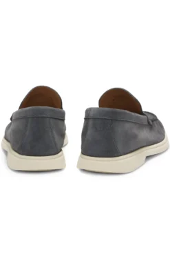 Suede loafers with embossed logo