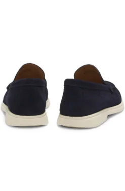 Suede loafers with embossed logo