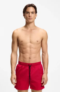 Swim shorts with contrast logo print