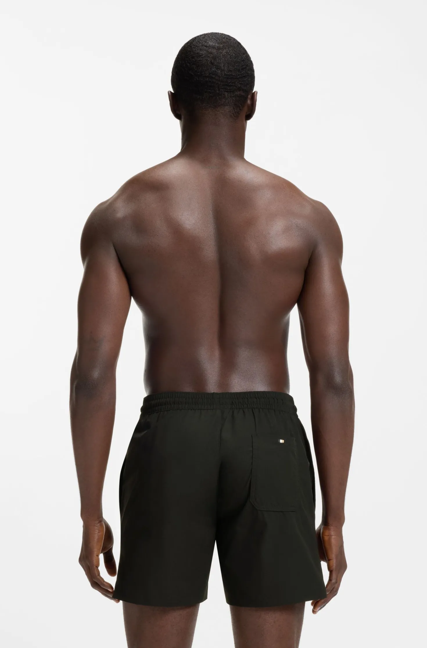 Swim shorts with logo stripe print