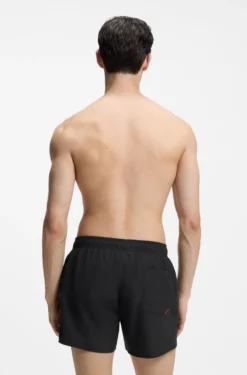 Swim shorts with repeat logos
