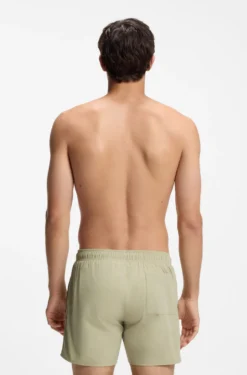 Swim shorts with signature stripe and logo