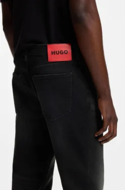 Tapered-fit jeans in black stretch denim