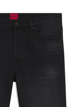 Tapered-fit jeans in black stretch denim