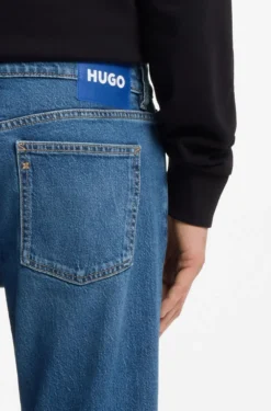 Tapered-fit jeans in mid-blue stretch denim