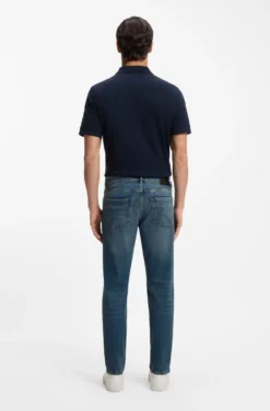 Tapered-fit jeans in washed-blue stretch denim