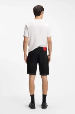 Tapered-fit shorts in black stretch denim