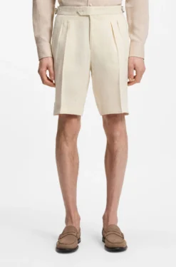 Tapered-fit shorts in linen with front pleats