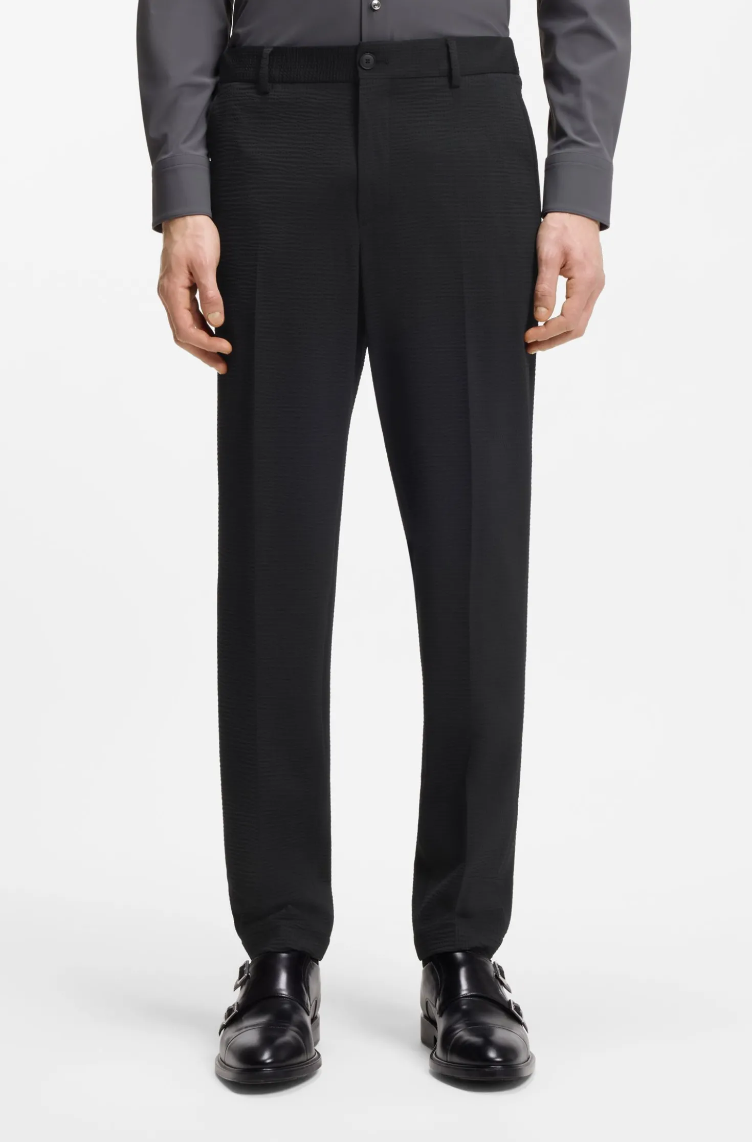 Tapered-fit trousers in stretch seersucker