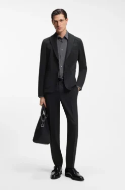 Tapered-fit trousers in stretch seersucker
