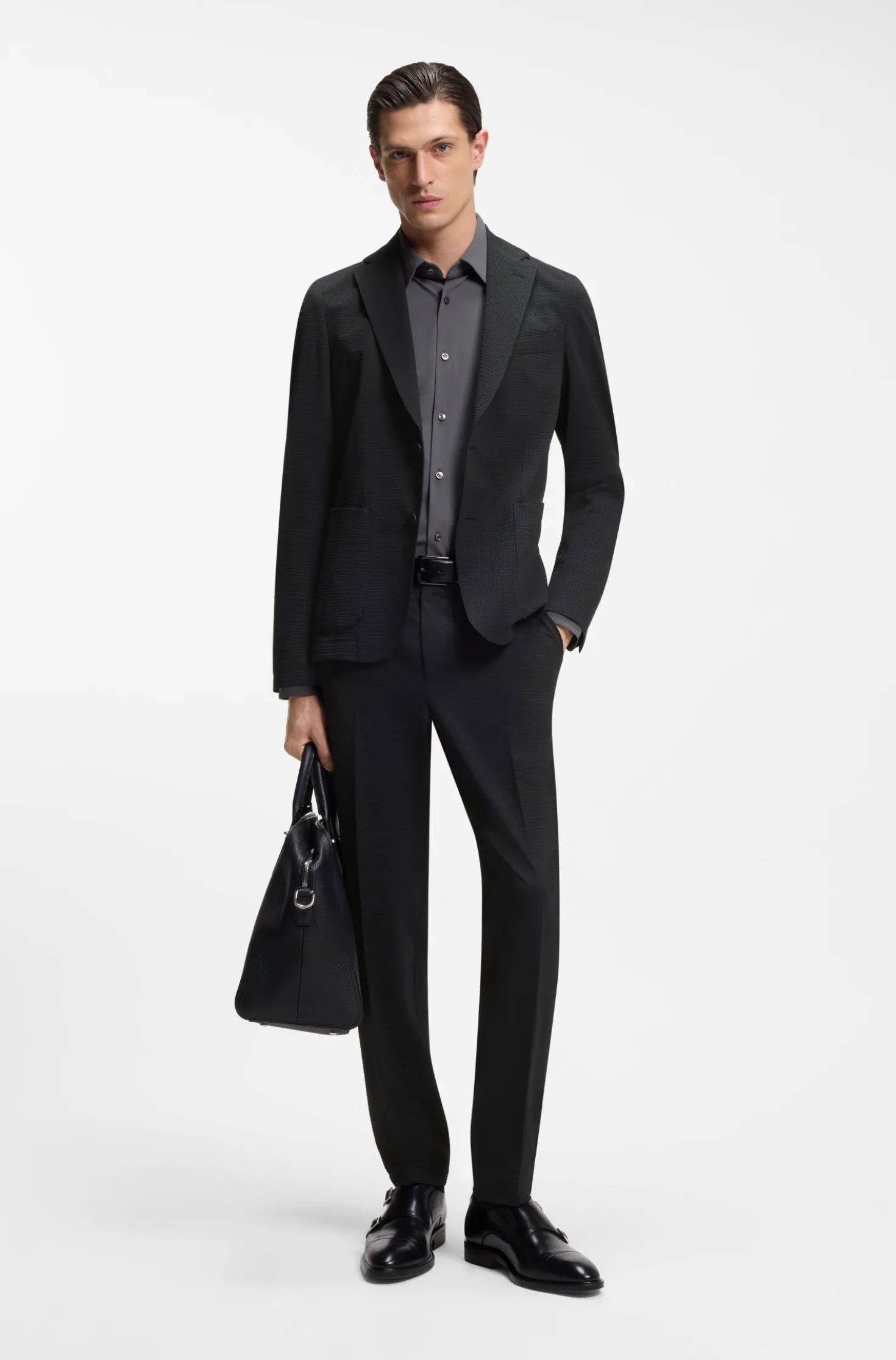 Tapered-fit trousers in stretch seersucker