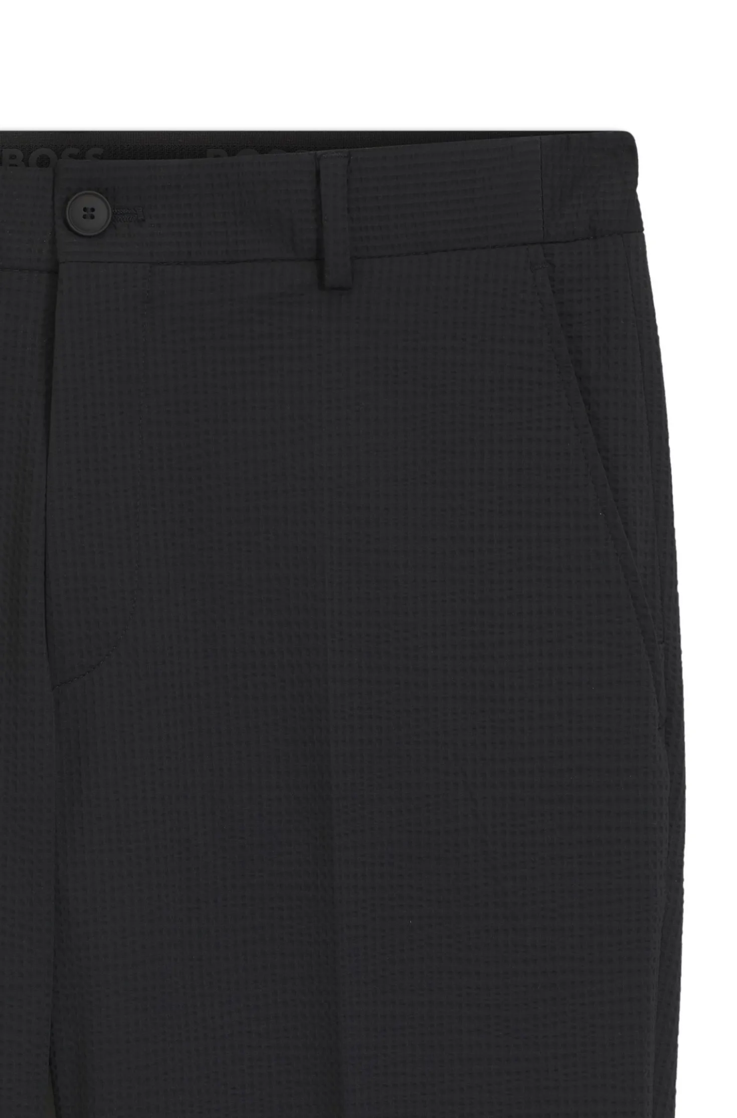 Tapered-fit trousers in stretch seersucker