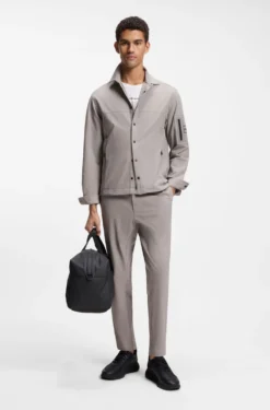 Tapered-fit trousers in waffle-structured stretch fabric