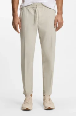 Tapered-fit trousers in water-repellent stretch fabric