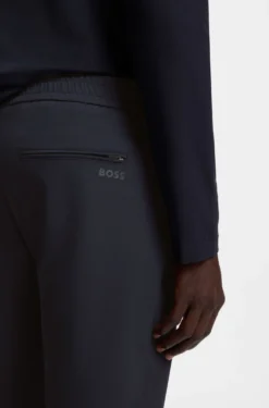 Tapered-fit trousers in water-repellent stretch fabric
