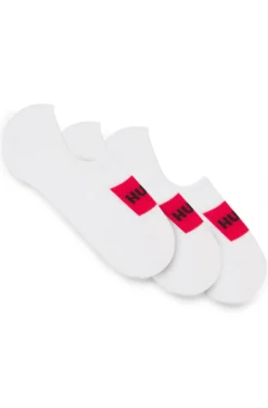 Three-pack of invisible socks with red logo labels
