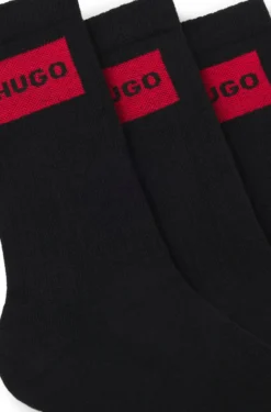 Three-pack of short socks with red logo labels