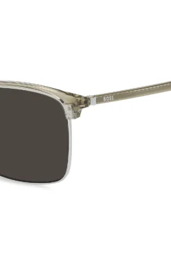 Titanium-temple sunglasses with lasered-engraved logos