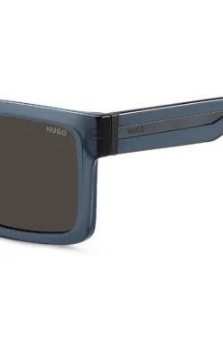 Transparent-blue sunglasses with grey lenses