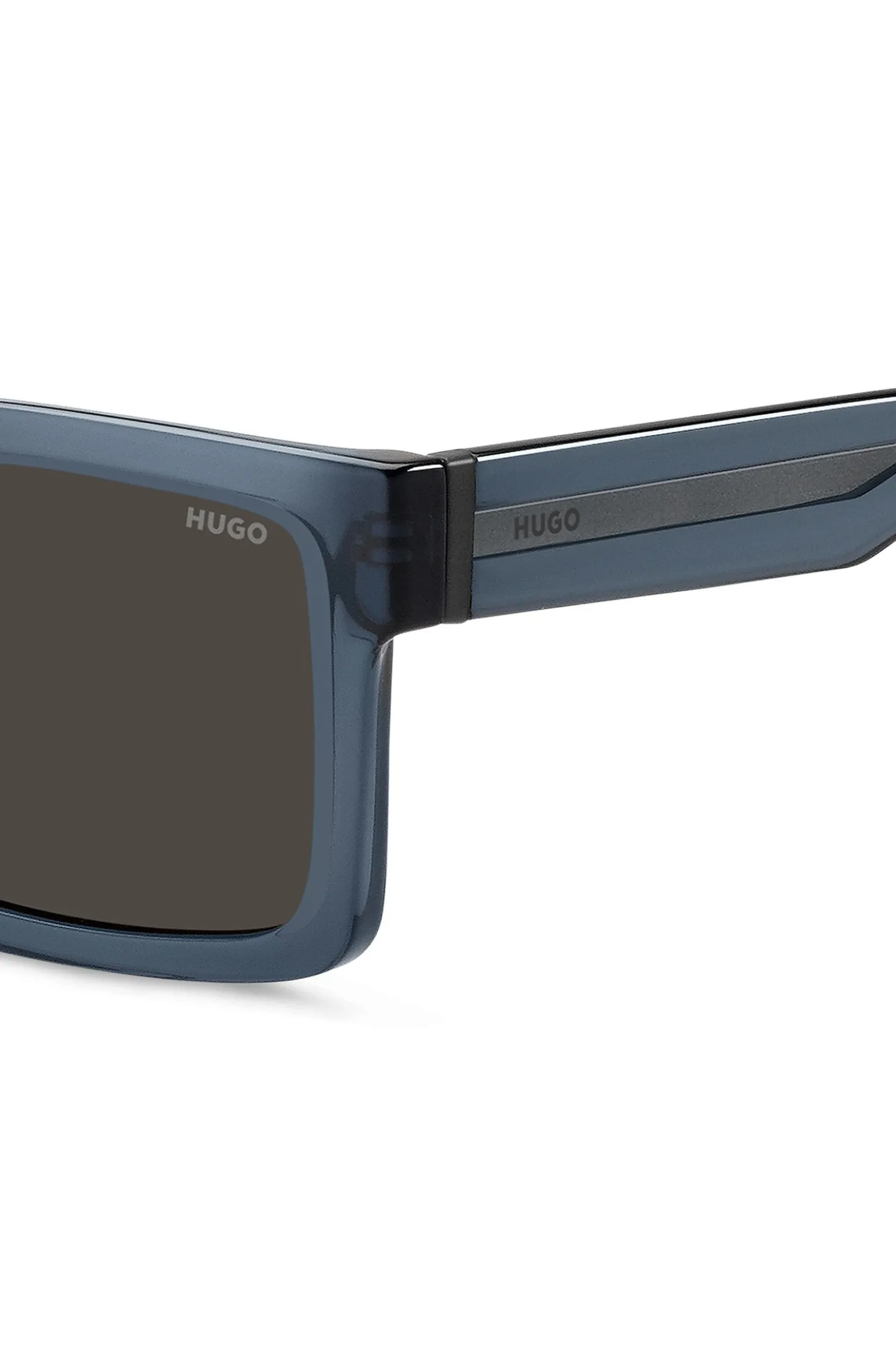 Transparent-blue sunglasses with grey lenses