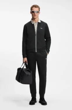 Triangle-jacquard tracksuit bottoms with rubberised logo