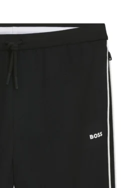 Triangle-jacquard tracksuit bottoms with rubberised logo