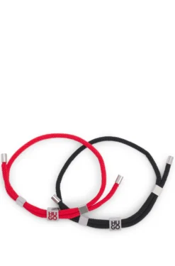 Two-pack of cord cuffs with logo plaques
