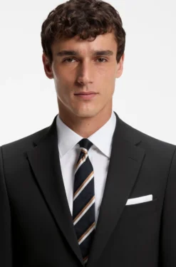 Two-piece suit in a melange stretch-wool blend