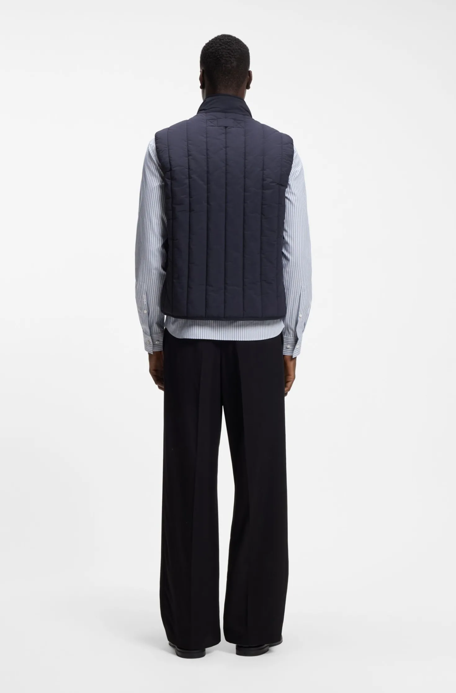 Vertical-quilted gilet with logo detail