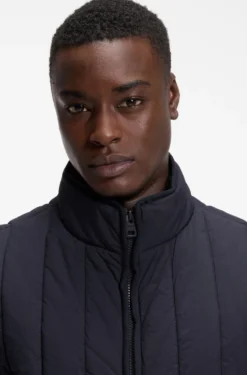 Vertical-quilted gilet with logo detail