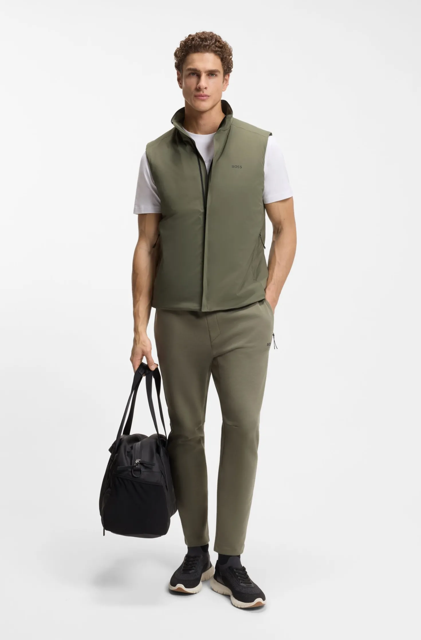 Water-repellent gilet in stretch fabric with logo detail