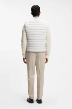 Water-repellent gilet with certified down filling