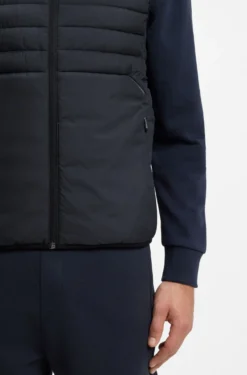 Water-repellent gilet with decorative reflective accents