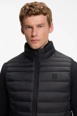 Water-repellent gilet with logo patch
