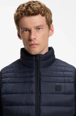 Water-repellent gilet with logo patch