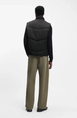 Water-repellent gilet with tonal logo