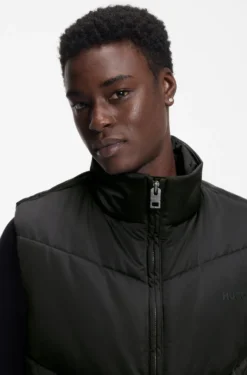 Water-repellent gilet with tonal logo