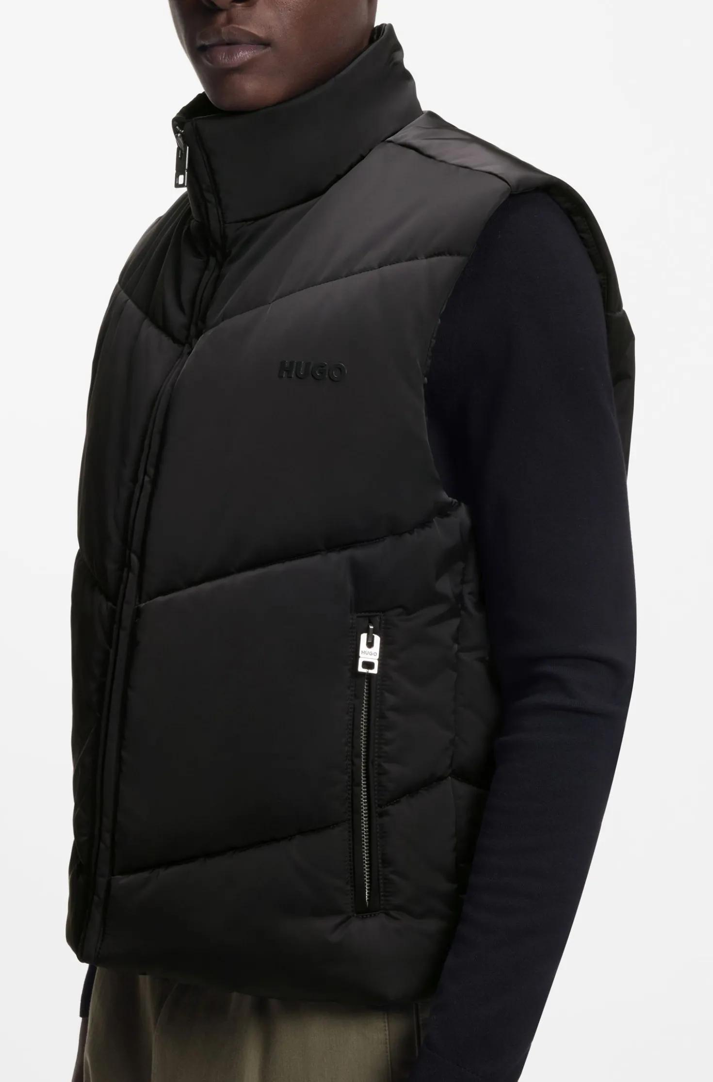 Water-repellent gilet with tonal logo