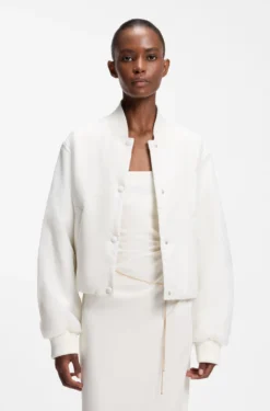 Water-repellent jacket with chiffon overlay