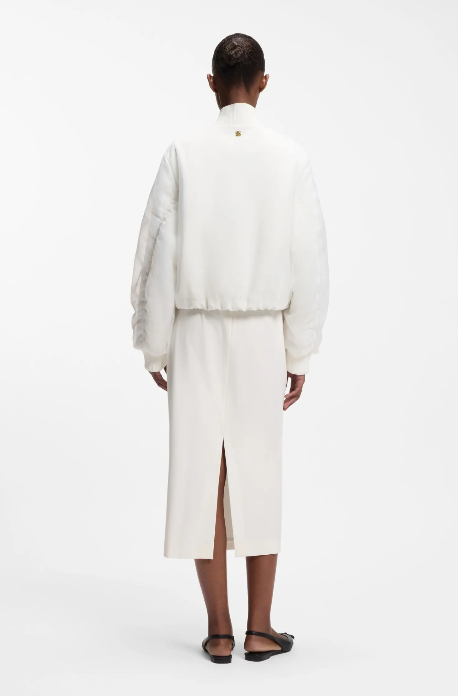 Water-repellent jacket with chiffon overlay