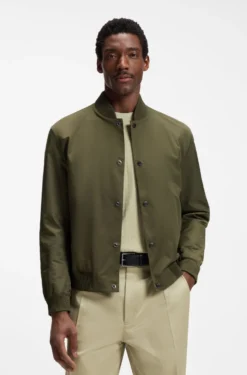 Water-repellent jacket with monogram-pattern sleeves