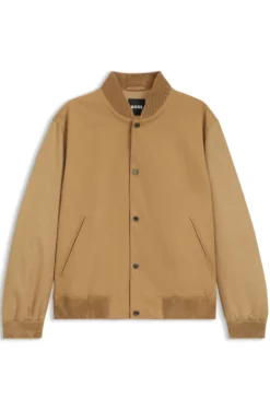 Water-repellent jacket with monogram-pattern sleeves