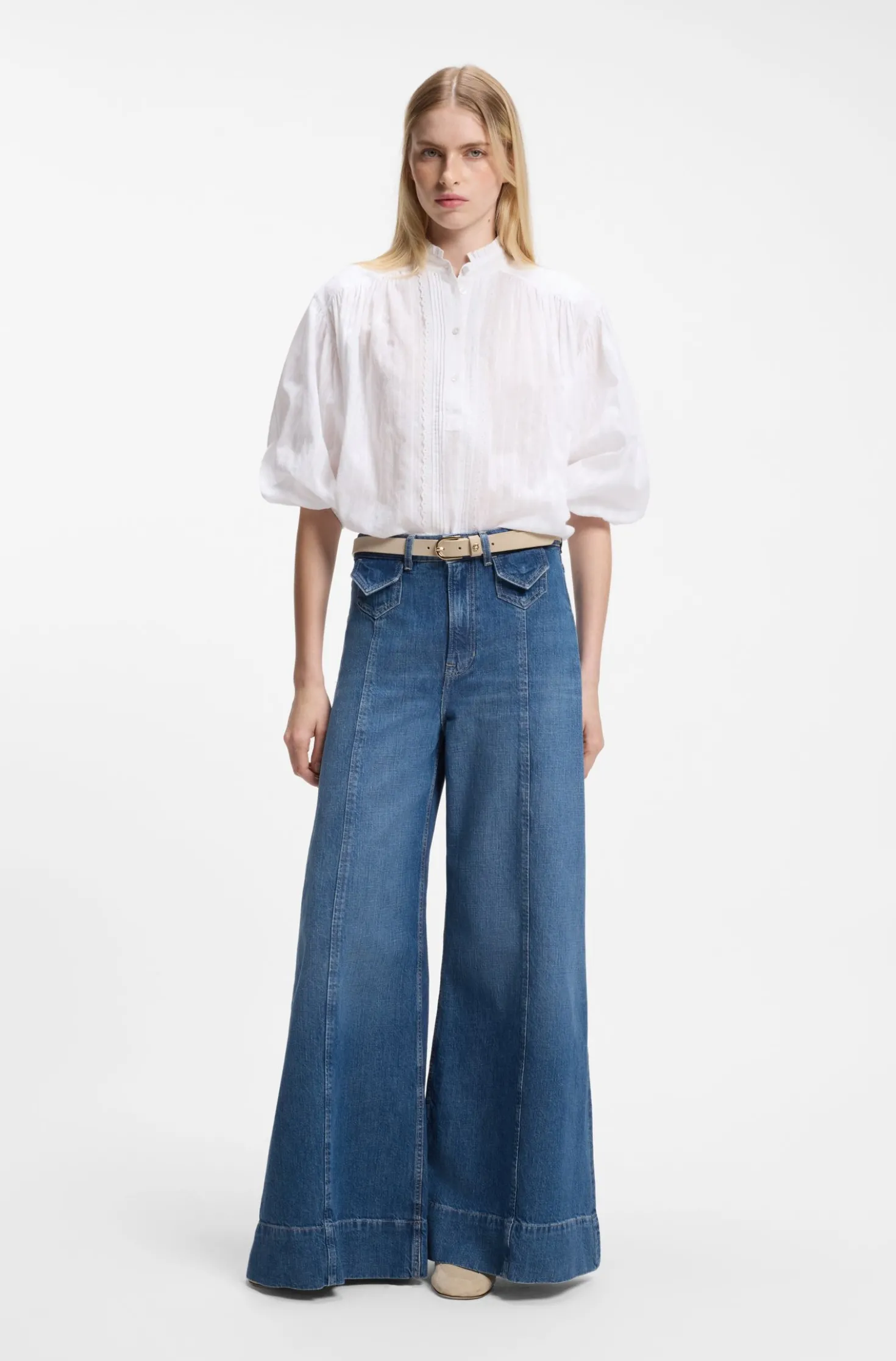 Wide-leg high-rise jeans in vintage-wash denim
